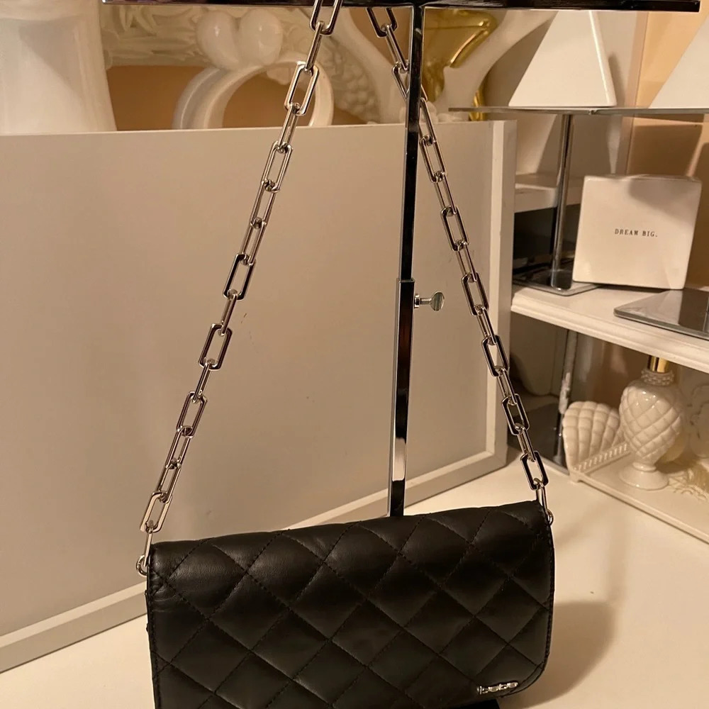 Bebe beautiful shoulder bag, new condition with sliver hardware